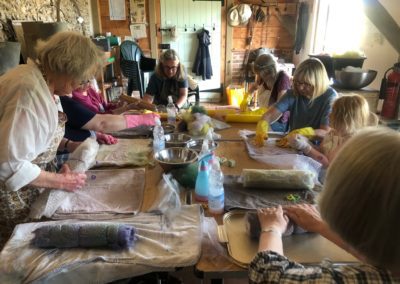 participants during a workshop dying sheared sheeps wool using natural dyes