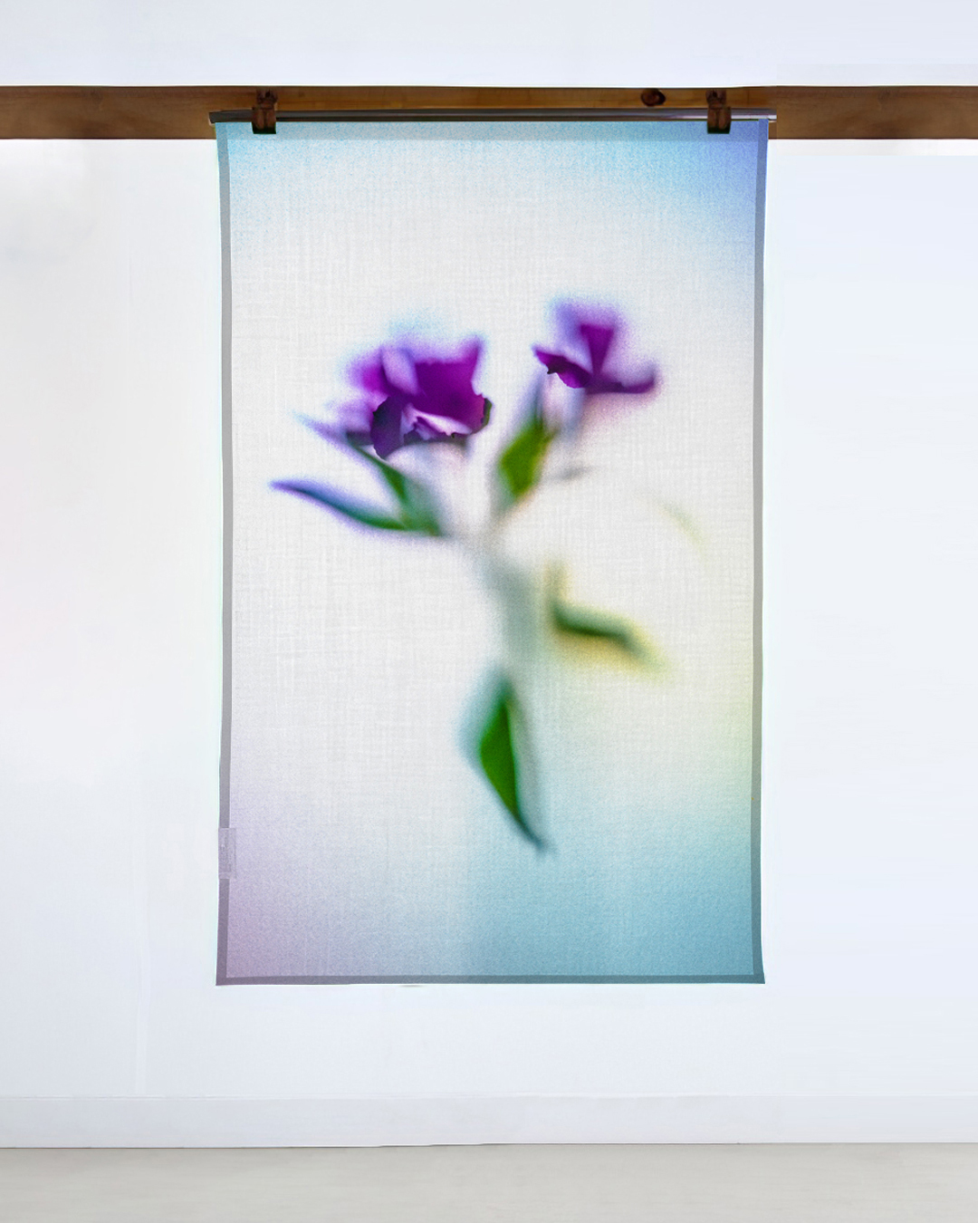 purples flowers on cloth