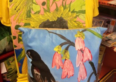 Lucy's Sunflowers and Birds printed on a t-shirt and mug