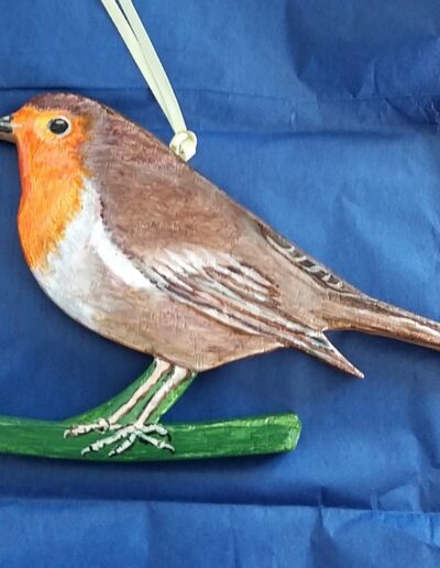 A robin decoration made out of wood