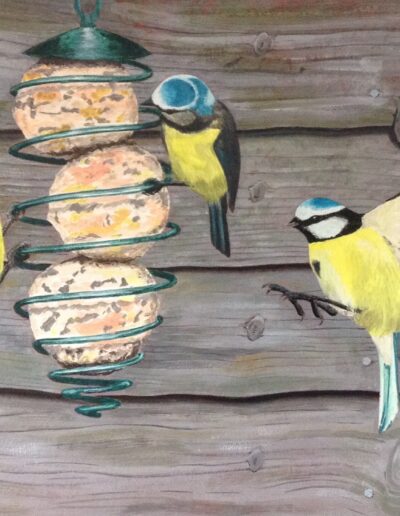 A painting of birds at a feeder