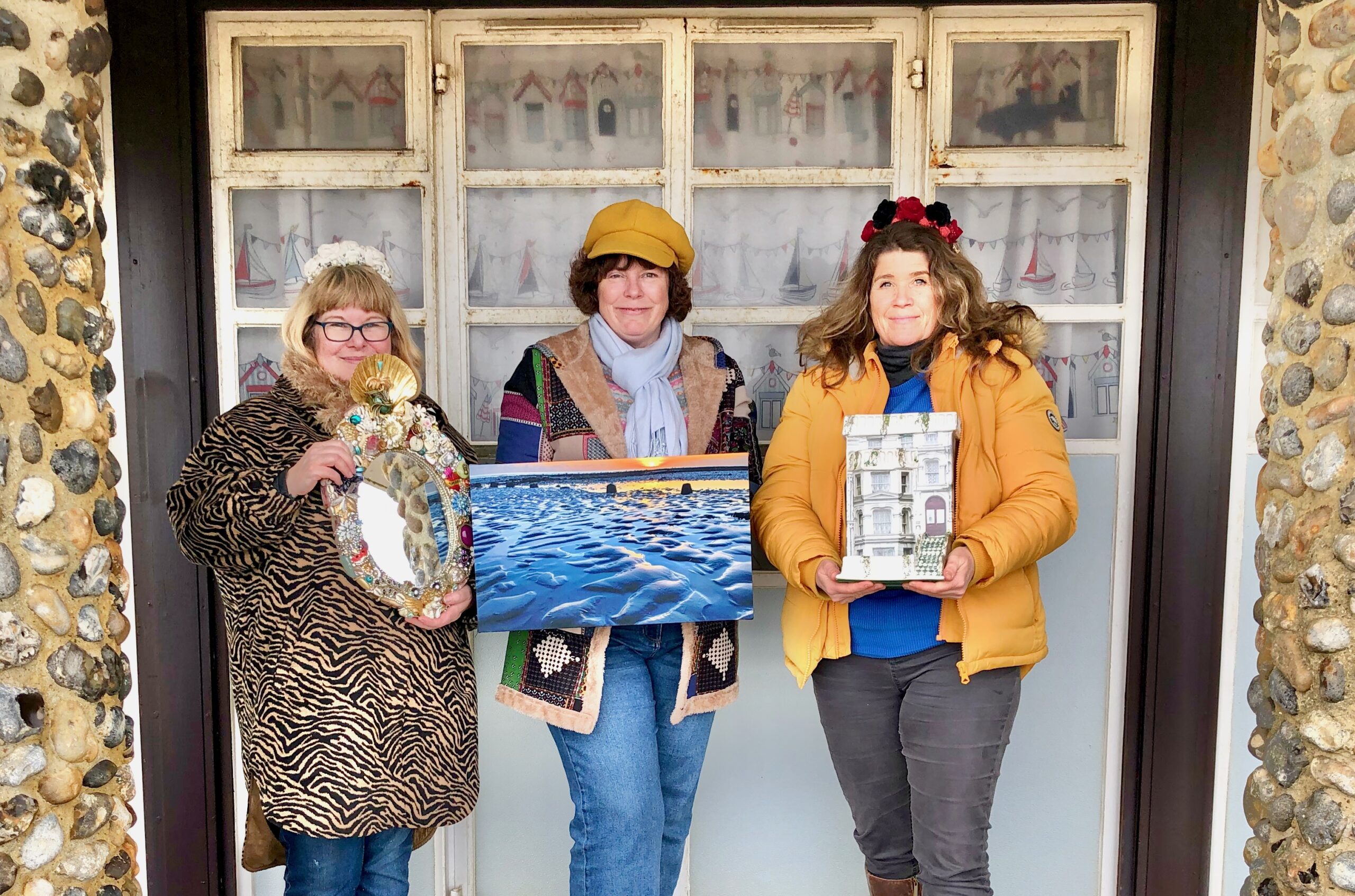 Lulu, Cathy and Alice with their artworks