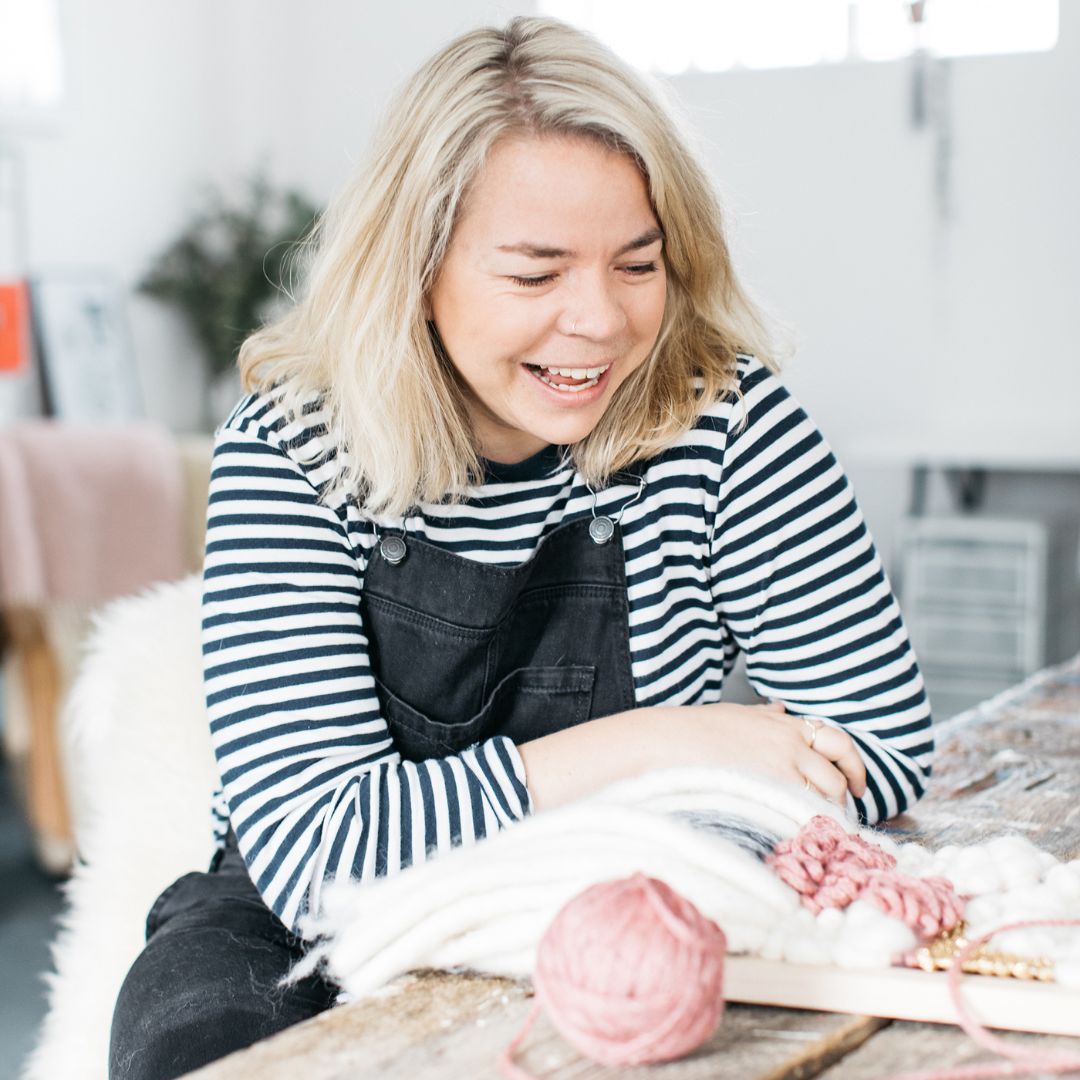 A photograph of Lucy Rowan in her studio