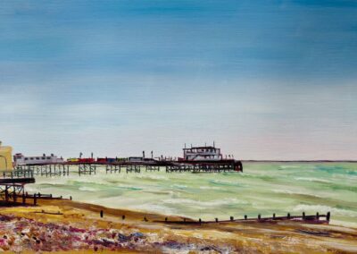 A painting of the beach with Worthing Pier in the background